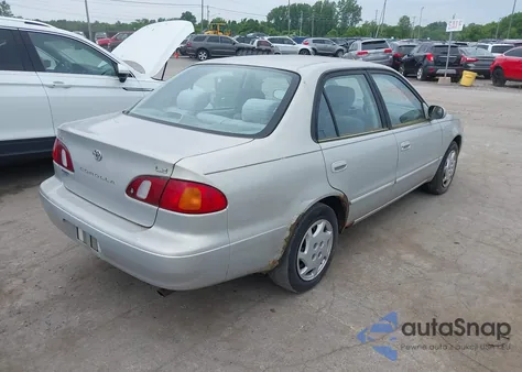 1999 Toyota Corolla Le from USA, damaged, VIN 2T1BR12E7XC154444